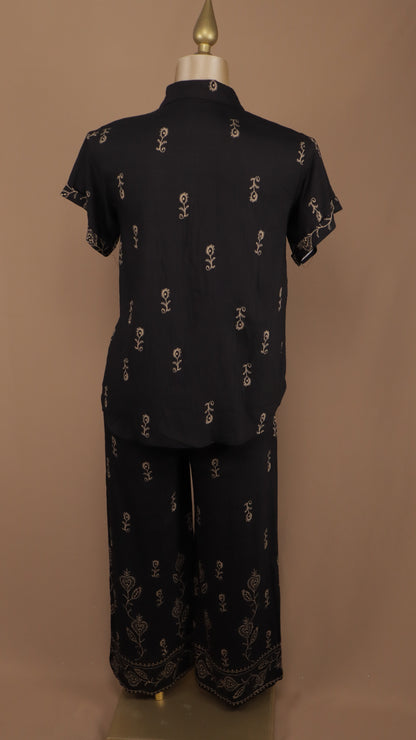 Conjunto plus size de pantalón y blusa holgada